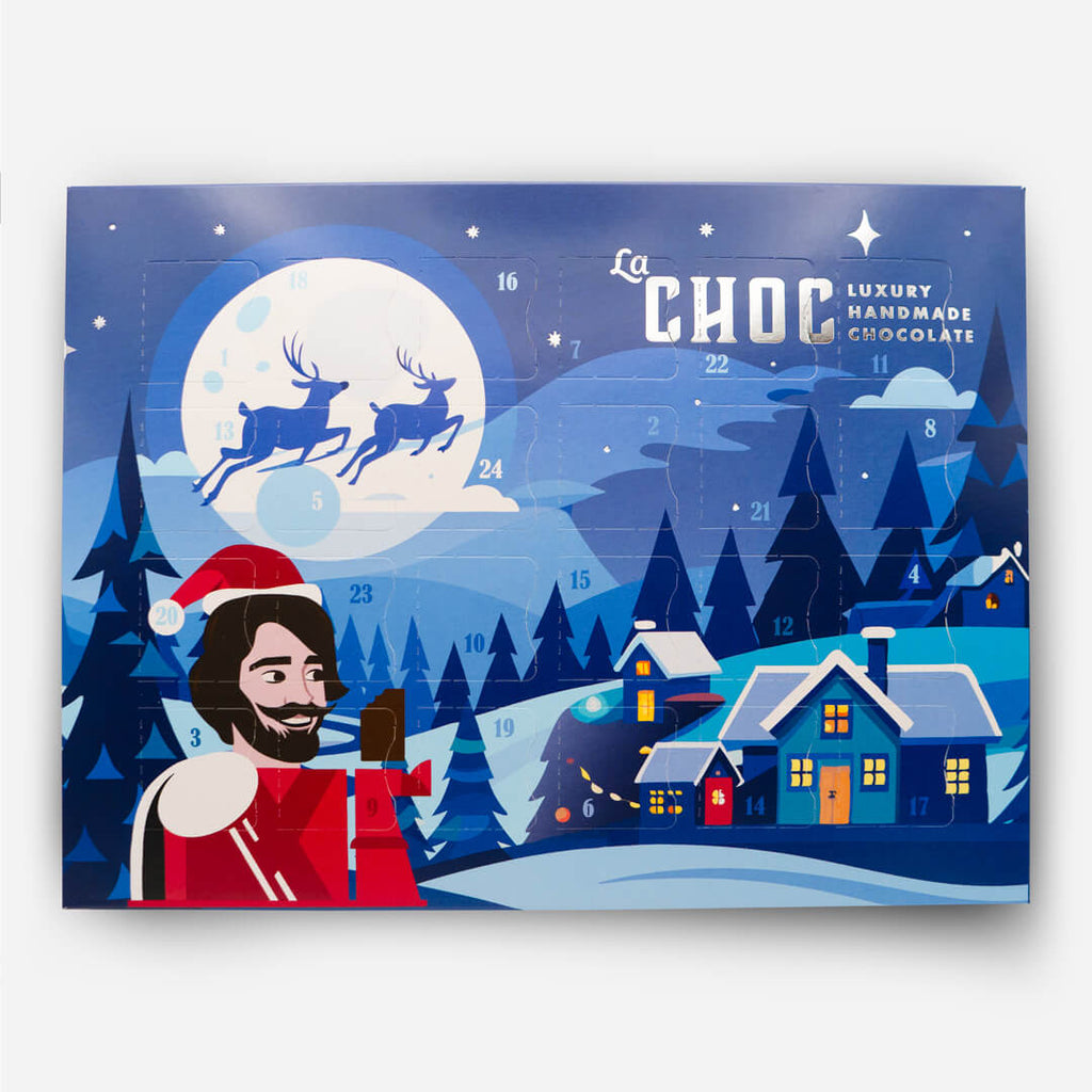 La Chocolatrice Christmas advent calendar featuring festive blue winter artwork with Santa and reindeer.