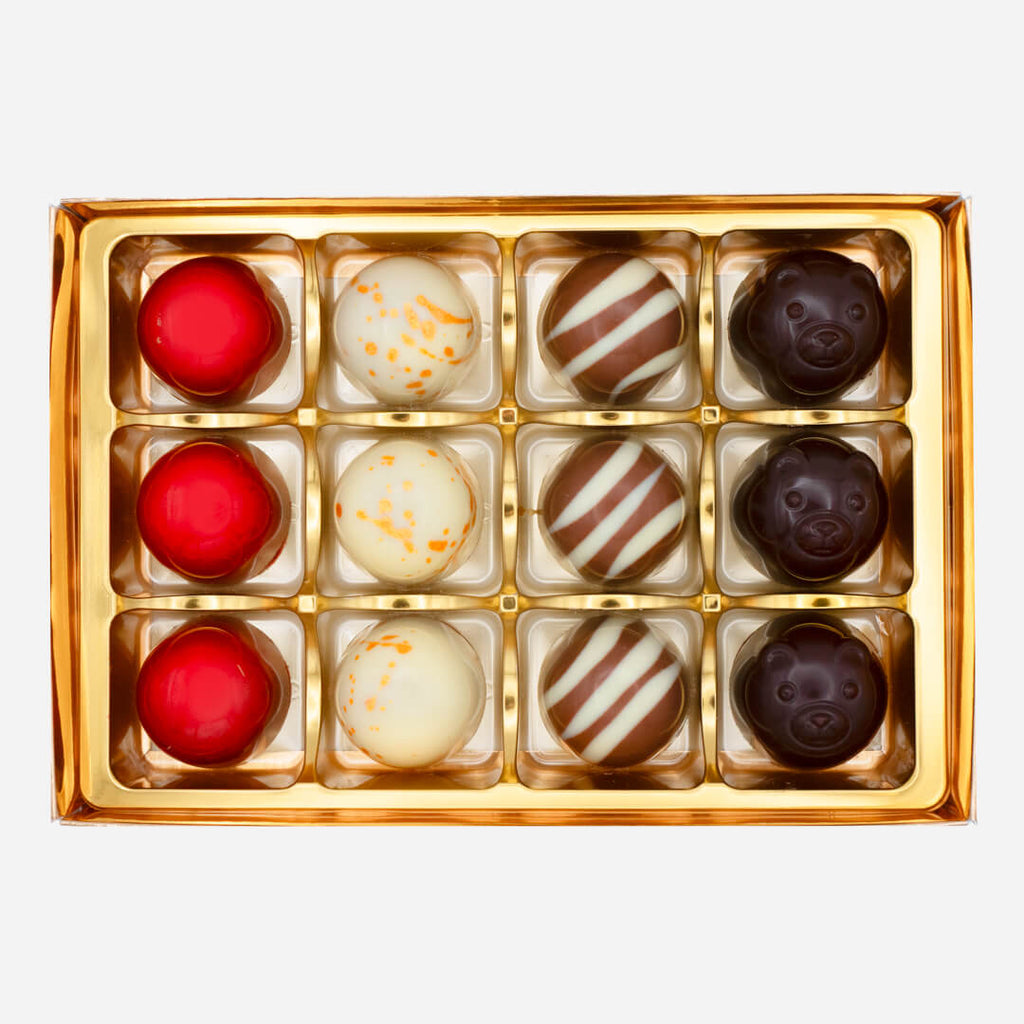 Festive handmade chocolate bonbons selection with assorted flavours from La Chocolatrice gift box.