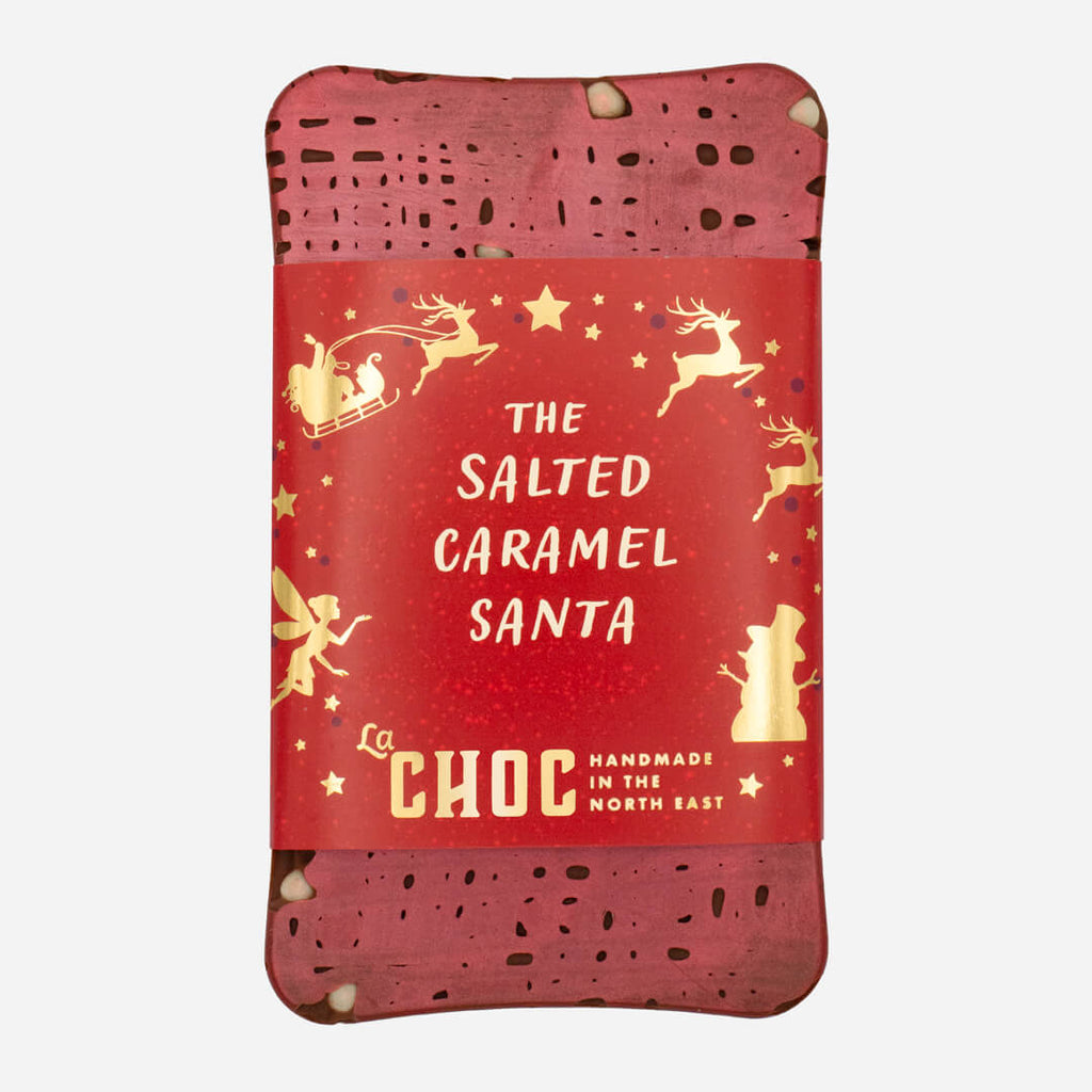 Salted caramel chocolate bar from La Chocolatrice, handmade and wrapped in red and gold Santa packaging.